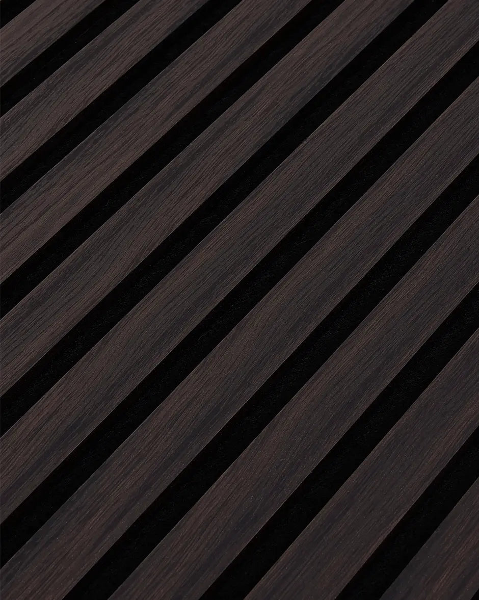Close-up of the dark walnut woodgrain finish and vertical slat texture on NORDAN acoustic wall panels.